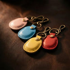 4 Pack Genuine Leather Airtag Holder Compatible with Apple AirTag Keychain 2nd & 1st Gen (Pink/Light Blue/Yellow/True Red)