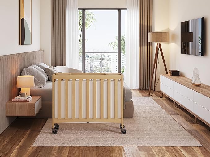 Foundations Travel Sleeper Wood Compact Folding Crib - Image 6